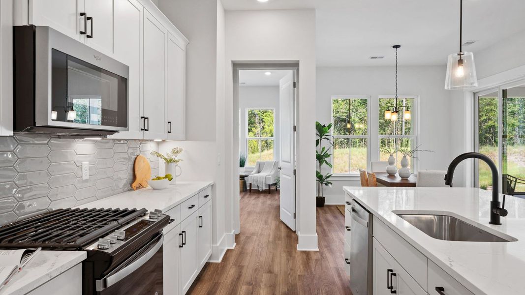 Furnished interior view inside a new home in Summerwind Crossing at Lakes of Cane Bay, Summerville (Image 6).