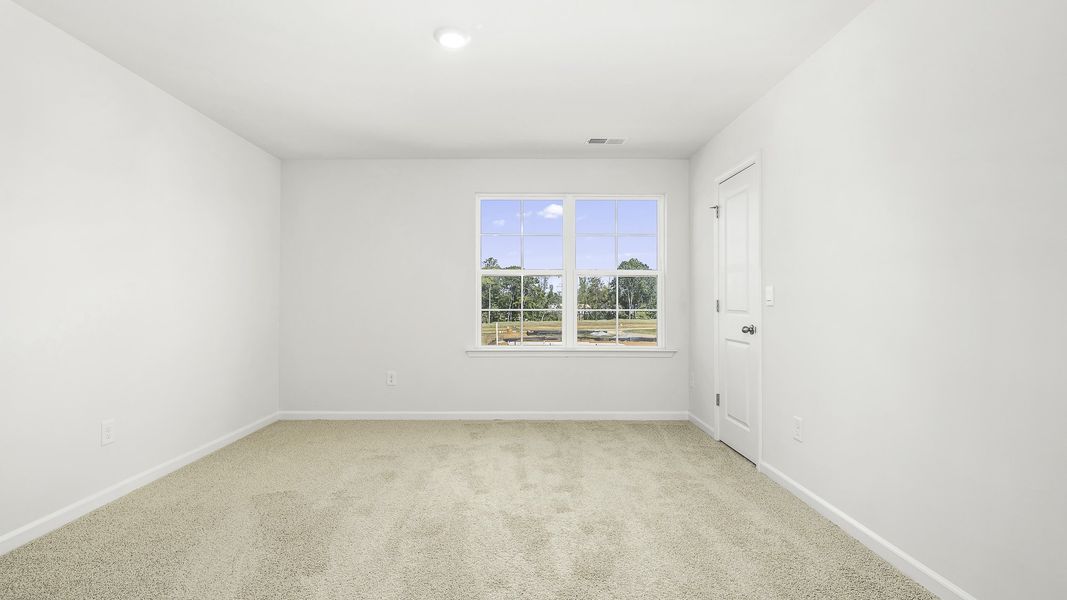 Representative unfurnished interior of a home built from the WINSTON by D.R. Horton in The Preserve at Kinsley, Jamestown (Image 15).
