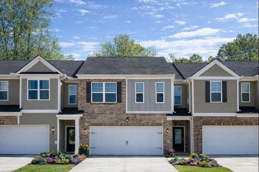 Front exterior of a new home in The Enclave at Whitewater Creek, Union City, GA, highlighting curb appeal (Image 2). Front exterior of a new home in The Enclave at Whitewater Creek, Union City, GA, highlighting curb appeal (Image 2).