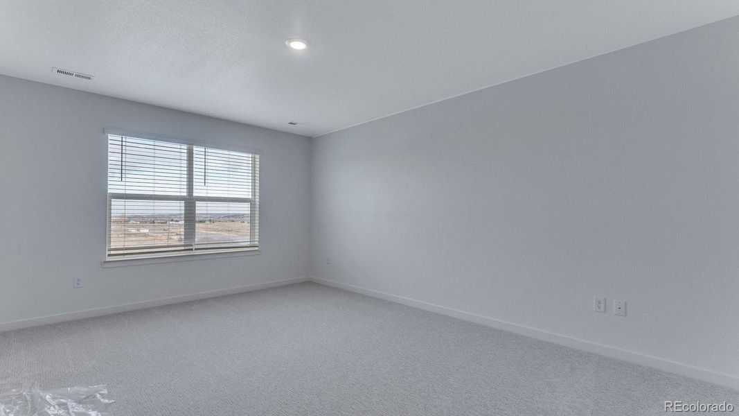 Spacious, unfurnished interior of a new home in Trails at Crowfoot, Parker (Image 20).