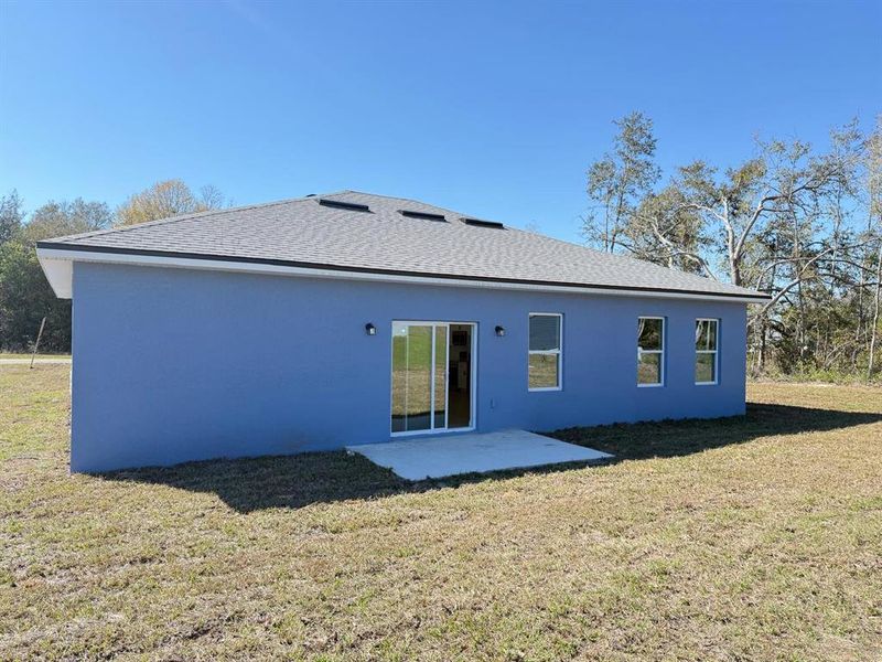 Front exterior of a new home in , Ocala, FL, highlighting curb appeal (Image 1).