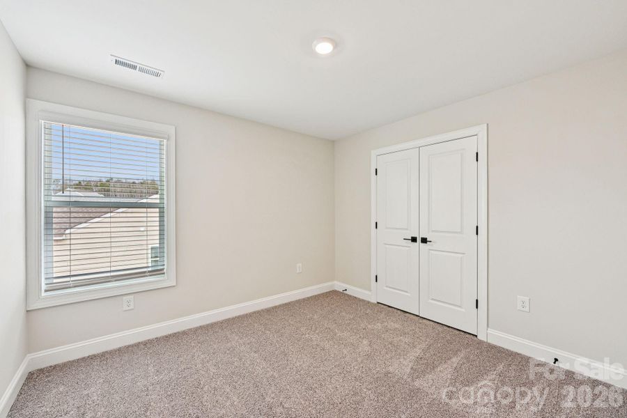 Spacious, unfurnished interior of a new home in Colonial Crossing, Troutman (Image 20).