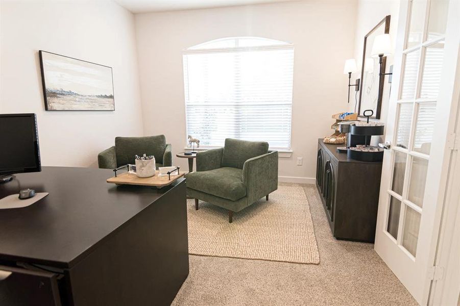 Office space featuring light colored carpet and baseboards Office space featuring light colored carpet and baseboards