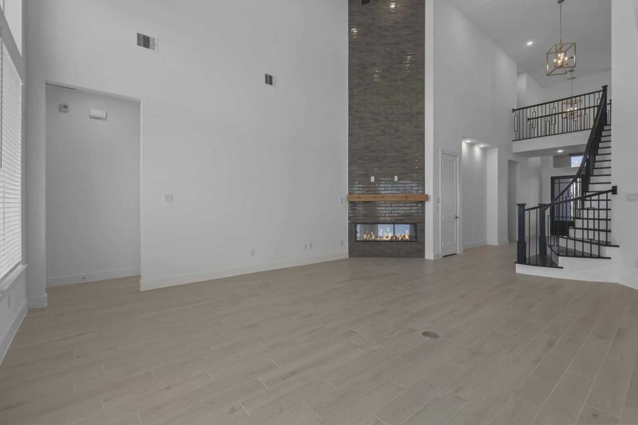 Representative unfurnished interior of a home built from the Waterford by Chesmar Homes in Meridiana 60's, Manvel (Image 26).