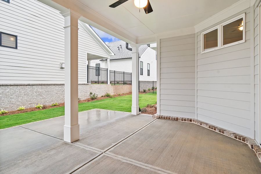 Representative exterior photo of a completed home built from the The McIntosh by The Providence Group in Promenade at Sawnee Village, Cumming, GA (Image 1).