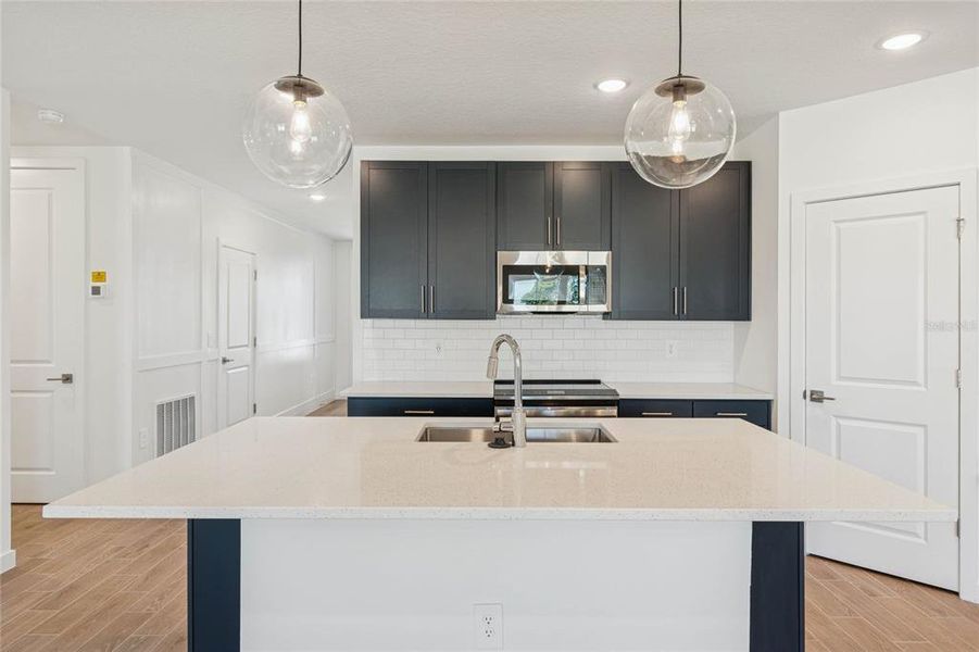 Furnished interior view inside a new home in Aspire at Canter Creek, Davenport (Image 14).