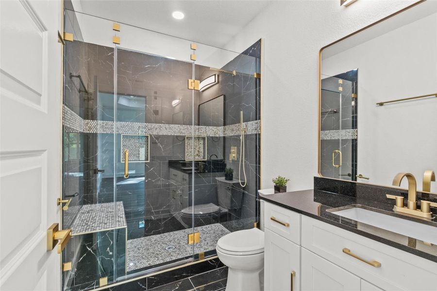 Luxury walk-in shower with frameless glass and modern fixtures Luxury walk-in shower with frameless glass and modern fixtures