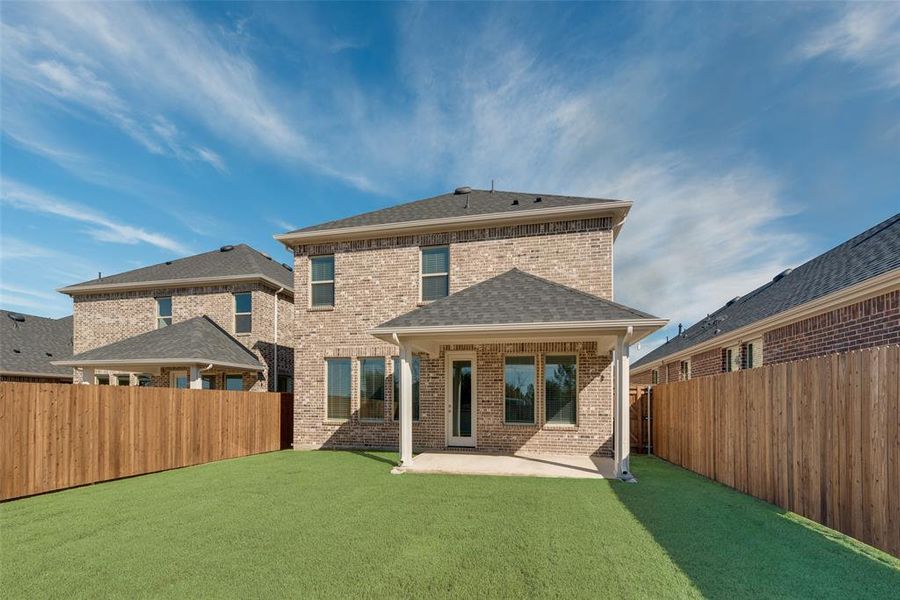 Exterior details and patio area of a home in Walden Pond, Forney (Image 3).
