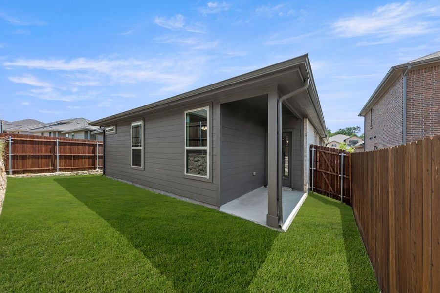 Representative exterior photo of a completed home built from the Mesquite by Impression Homes in Bryant Farms, Melissa, TX (Image 26). Representative exterior photo of a completed home built from the Mesquite by Impression Homes in Bryant Farms, Melissa, TX (Image 26).