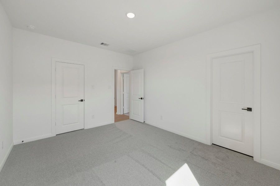 Spacious, unfurnished interior of a new home in The Grand Prairie 50’, Hockley (Image 27).