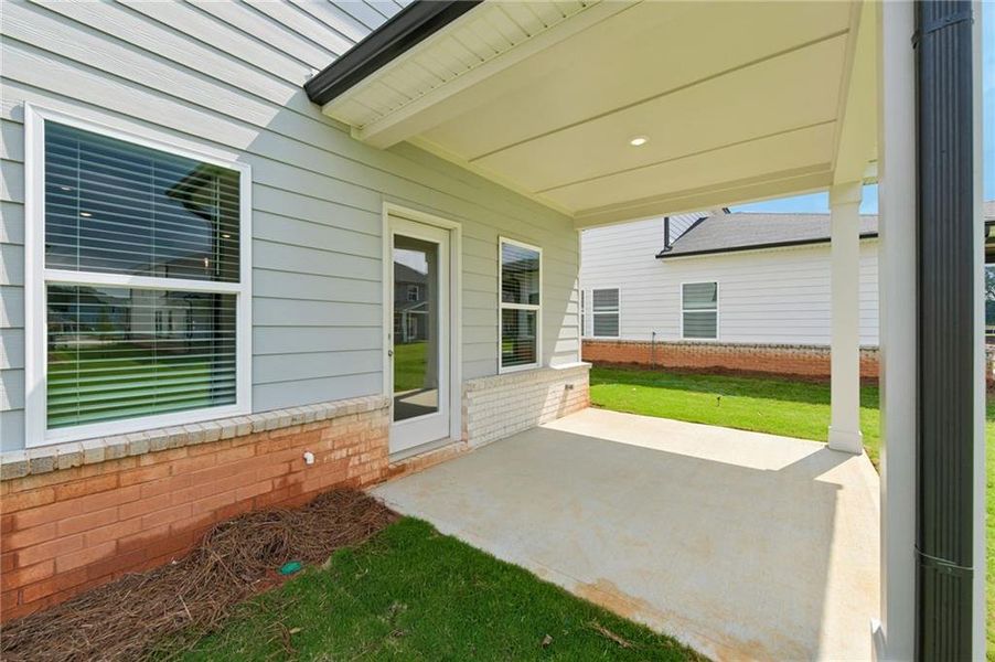 Exterior details and patio area of a home in Martin Springs - Reserve Series, Lawrenceville (Image 27). Exterior details and patio area of a home in Martin Springs - Reserve Series, Lawrenceville (Image 27).