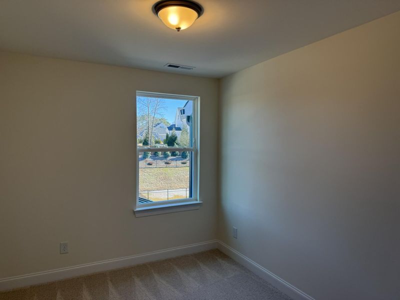 Spacious, unfurnished interior of a new home in Enclave at Traditions Townhomes, Wake Forest (Image 15).