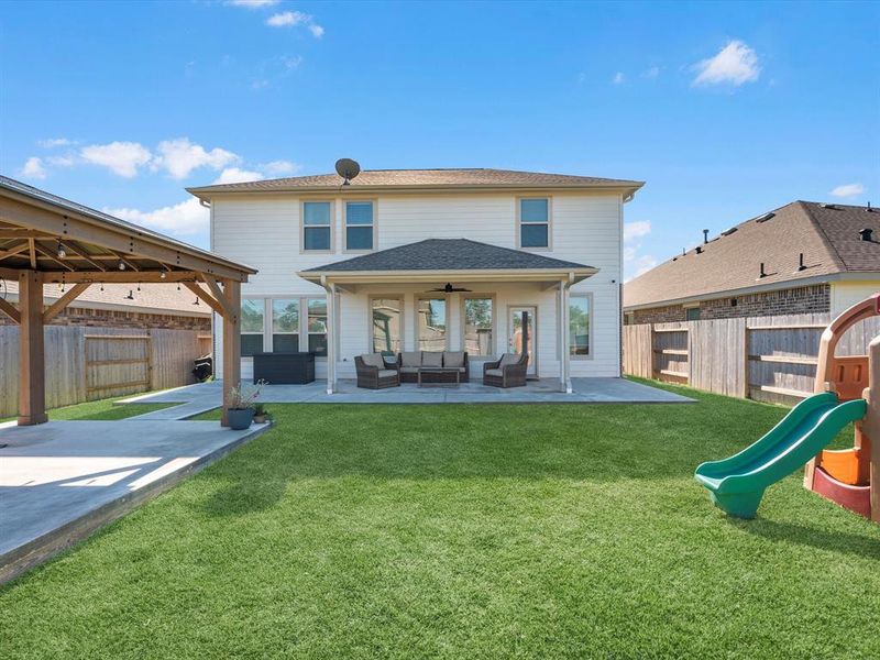 Carefully curated backyard, w/ multiple comfortable entertaining areas