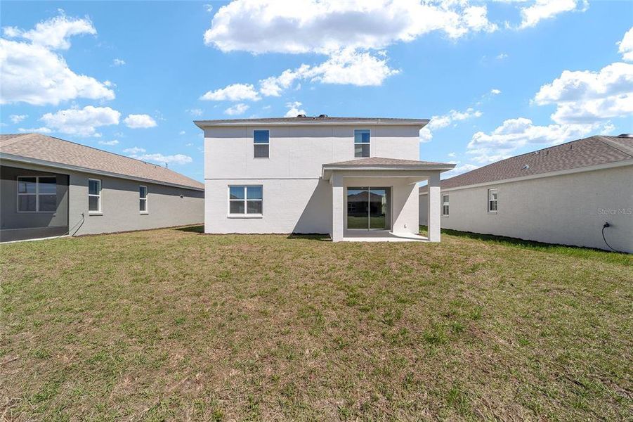 Exterior details and patio area of a home in Calesa Township, Ocala (Image 26).
