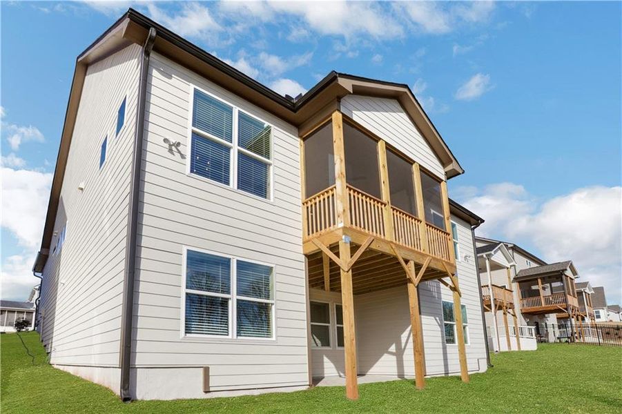 Exterior details and patio area of a home in Twin Lakes, Hoschton (Image 26).