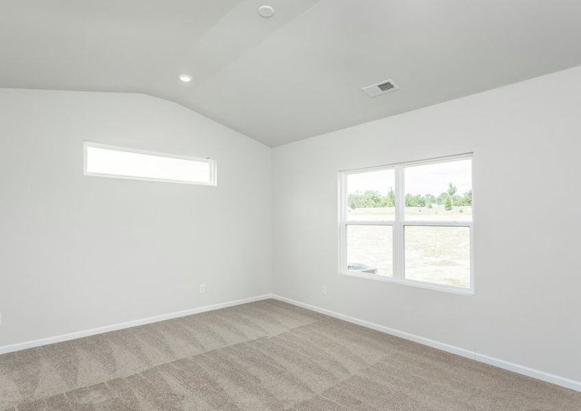 The master bedroom has plenty of space for king-sized furniture