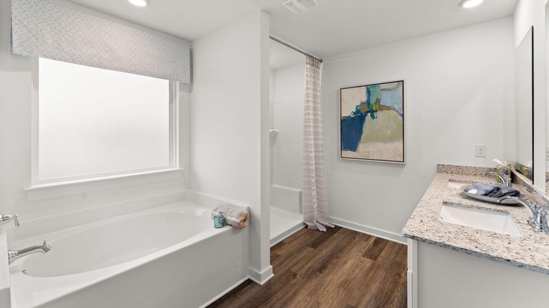 Furnished interior view inside a new home in Magnolia at the Bluffs Phase 3, Freeport (Image 23).