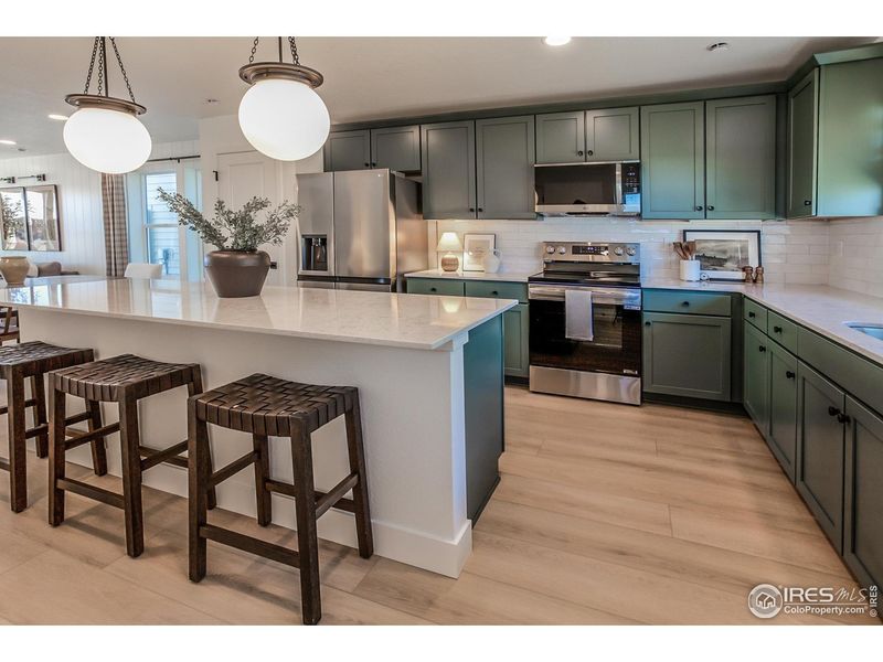 Furnished interior view inside a new home in Prairie Song Story Collection - Single Family Homes, Windsor (Image 27).