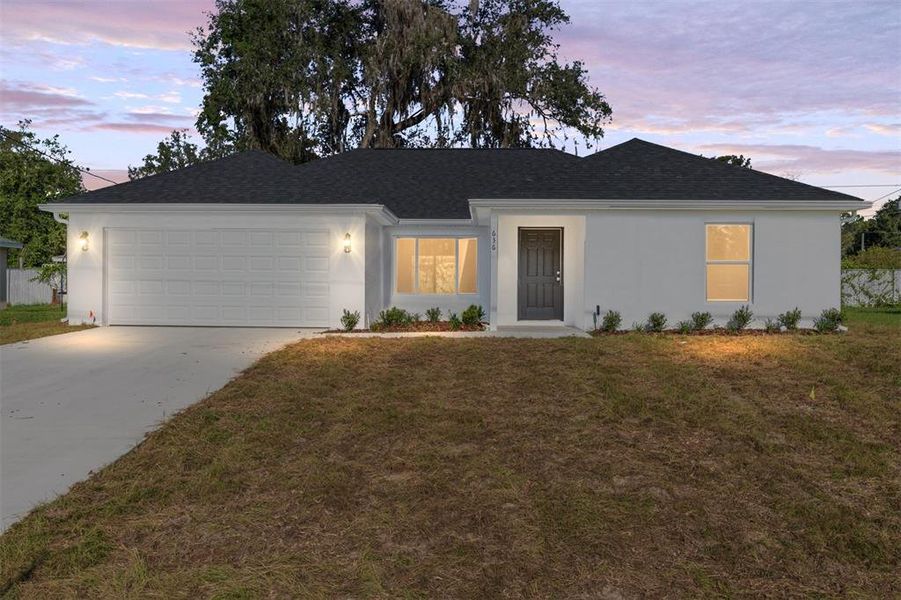 Front exterior of a new home in , Silver Springs, FL, highlighting curb appeal (Image 18). Front exterior of a new home in , Silver Springs, FL, highlighting curb appeal (Image 18).