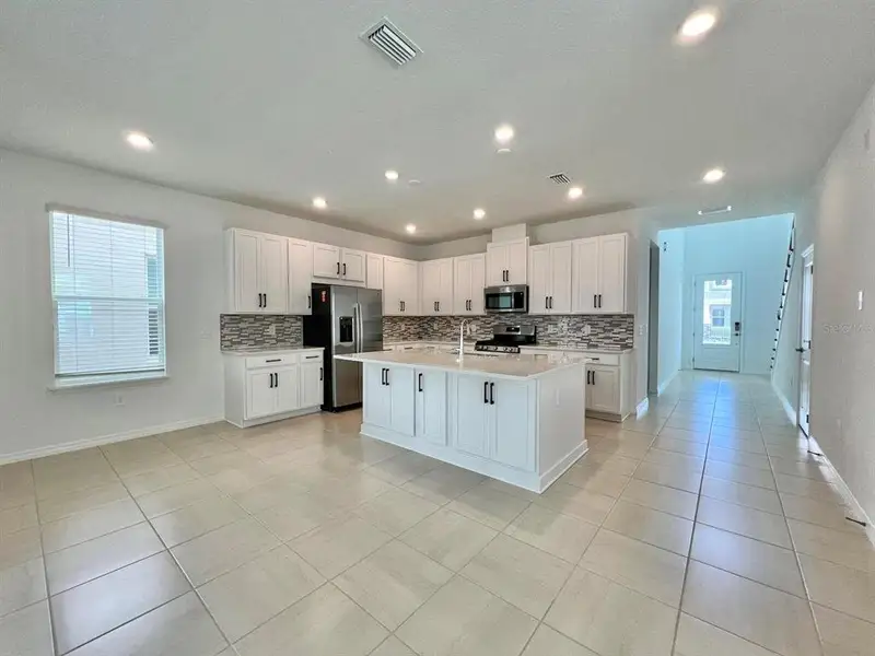 Furnished interior view inside a new home in , Winter Garden (Image 3).