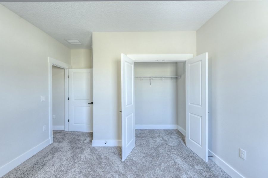 Representative unfurnished interior of a home built from the Julington by Riverside Homes in Hidden Creek at SilverLeaf 70' Series, St. Augustine (Image 32).