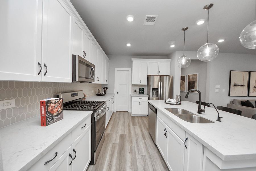 Furnished interior view inside a new home in Sunterra: Landmark Collection, Katy (Image 15).