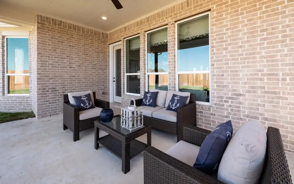 Exterior details and patio area of a home in High Park Hill, Arrington (Image 3).