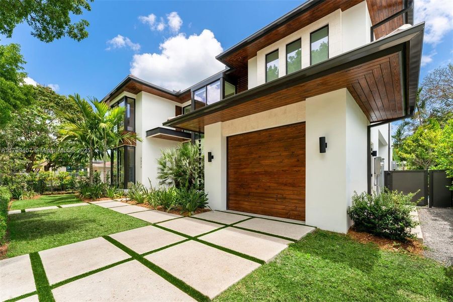 Front exterior of a new home in , Miami, FL, highlighting curb appeal (Image 22).