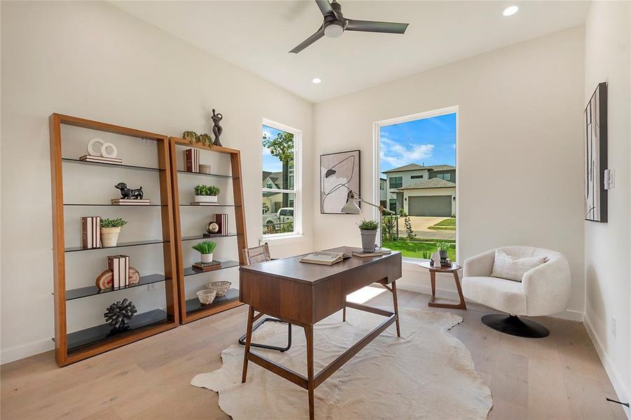 Office featuring light wood-type flooring and ceiling fan