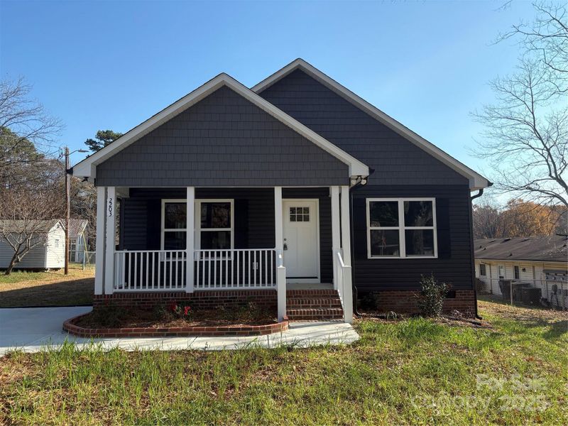 Front exterior of a new home in , Kannapolis, NC, highlighting curb appeal (Image 1).