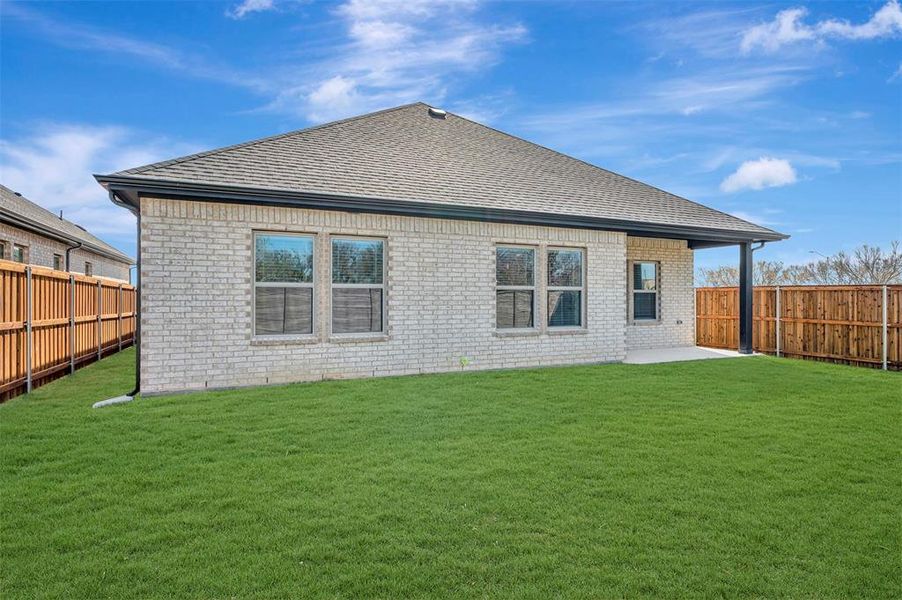Exterior details and patio area of a home in Aspire at Reunion, Newark (Image 3).