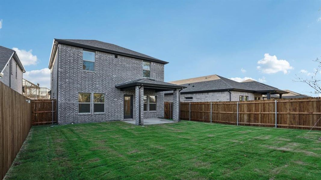 Exterior details and patio area of a home in Eastridge - Spring Series, McKinney (Image 22). Exterior details and patio area of a home in Eastridge - Spring Series, McKinney (Image 22).
