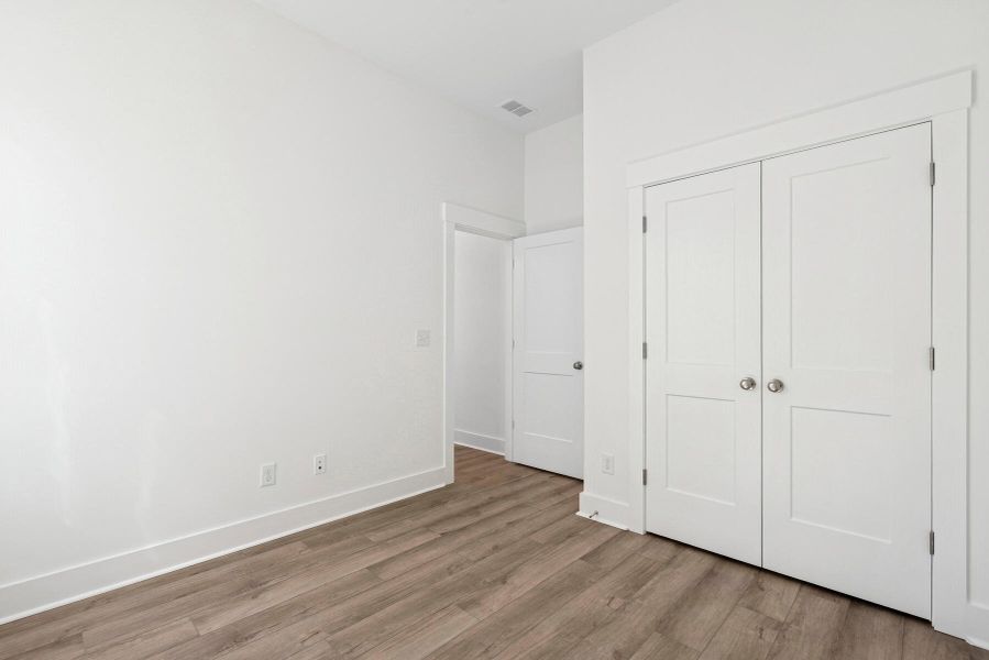 Spacious, unfurnished interior of a new home in Nexton – Midtown – The Garden Collection, Summerville (Image 23). Spacious, unfurnished interior of a new home in Nexton – Midtown – The Garden Collection, Summerville (Image 23).