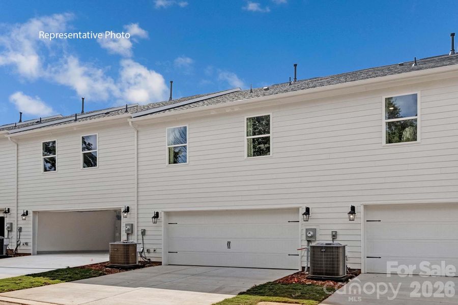 Exterior details and patio area of a home in Sanctuary at Southgate, Indian Trail (Image 3).