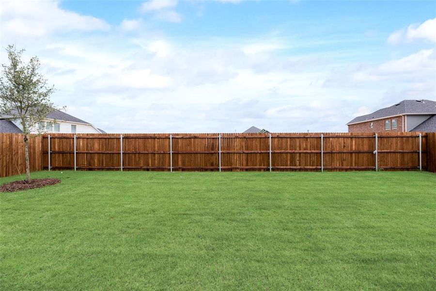 Front exterior of a new home in Sutton Fields, Celina, TX, highlighting curb appeal (Image 18).