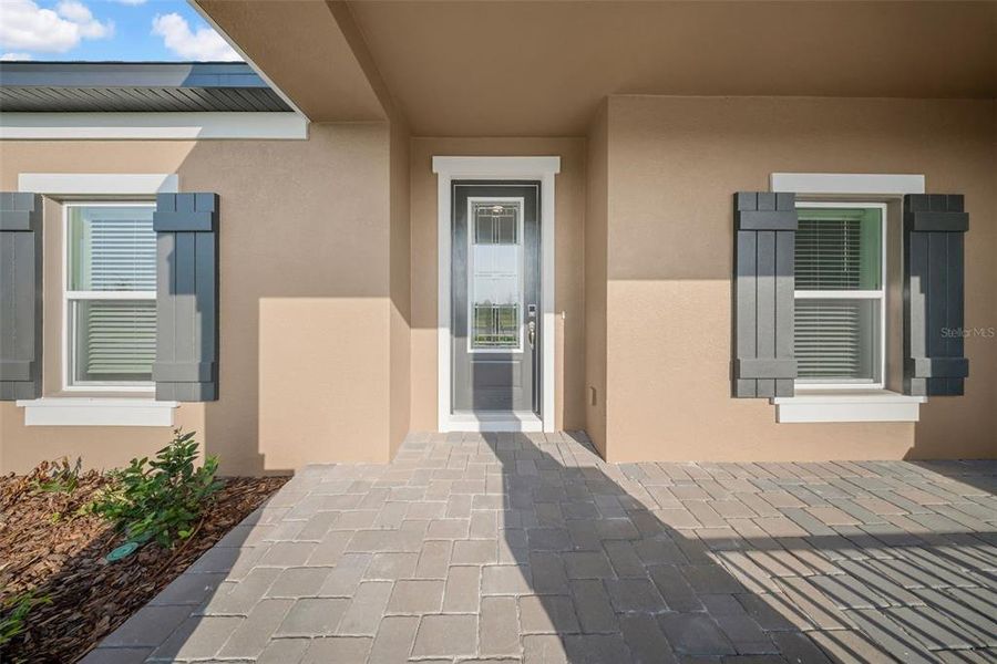 Front exterior of a new home in , Wesley Chapel, FL, highlighting curb appeal (Image 2). Front exterior of a new home in , Wesley Chapel, FL, highlighting curb appeal (Image 2).