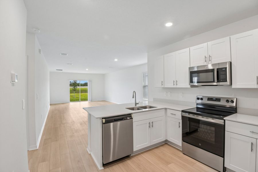 Representative furnished interior of a home built from the Blackbird by Taylor Morrison in Westview Community Group Page, Kissimmee (Image 5).