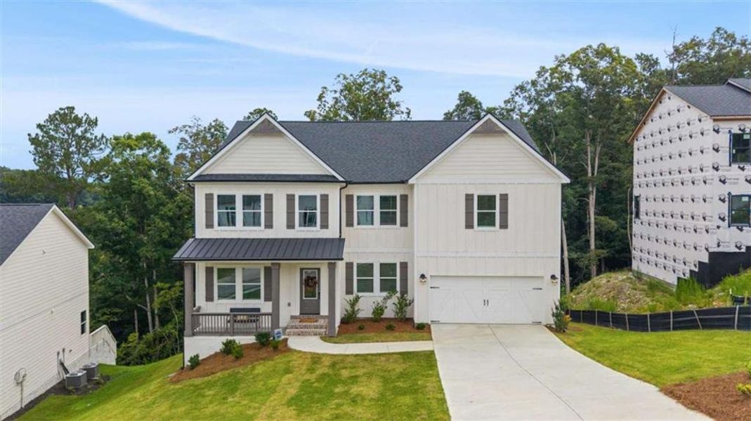 Front exterior of a new home in Silvercrest Lakes, Acworth, GA, highlighting curb appeal (Image 28).
