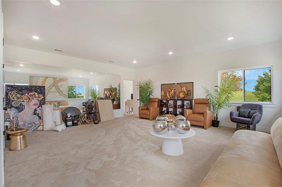 Living room with carpet and recessed lighting Living room with carpet and recessed lighting