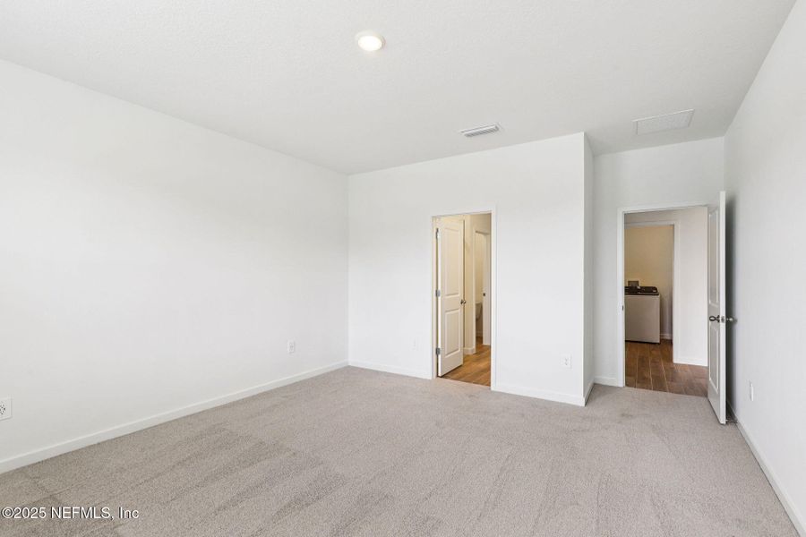 Spacious, unfurnished interior of a new home in Lakes at Bella Lago - Signature Series, Green Cove Springs (Image 26).