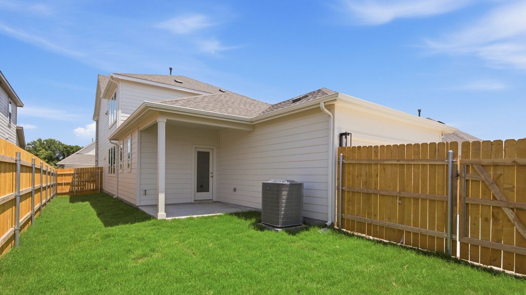 Exterior details and patio area of a home in Creeks Crossing, Elgin (Image 22). Exterior details and patio area of a home in Creeks Crossing, Elgin (Image 22).