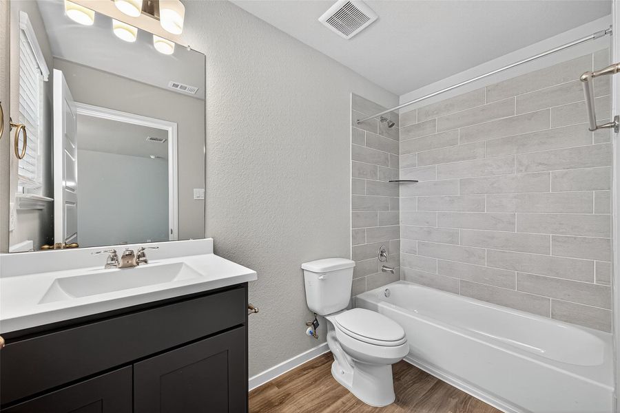 Furnished interior view inside a new home in Mill Creek Trails, Magnolia (Image 4). Furnished interior view inside a new home in Mill Creek Trails, Magnolia (Image 4).