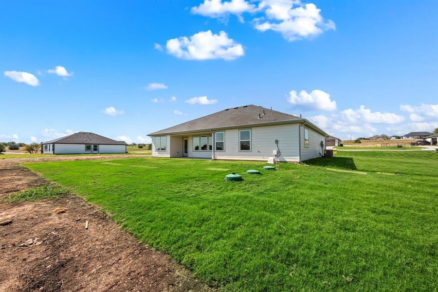 Exterior details and patio area of a home in Gatlin Ranch, Springtown (Image 19). Exterior details and patio area of a home in Gatlin Ranch, Springtown (Image 19).
