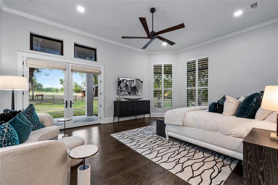 Bedroom with access to exterior, ceiling fan, dark wood-type flooring, and ornamental molding