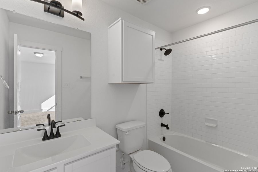 Furnished interior view inside a new home in Hickory Ridge, Elmendorf (Image 8).