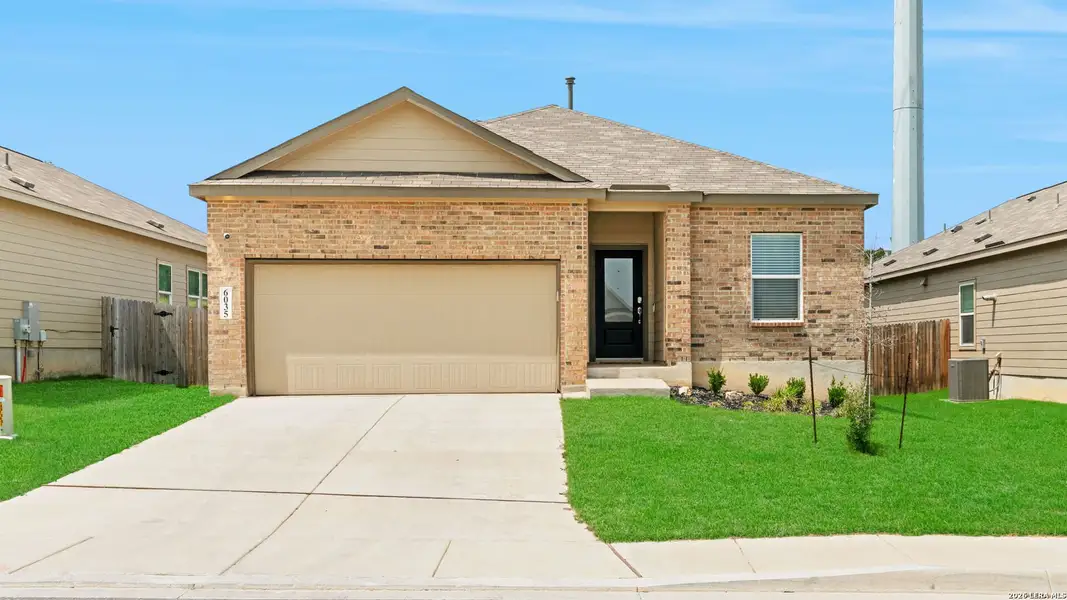 Front exterior of a new home in Hidden Trails, Bulverde, TX, highlighting curb appeal (Image 20).