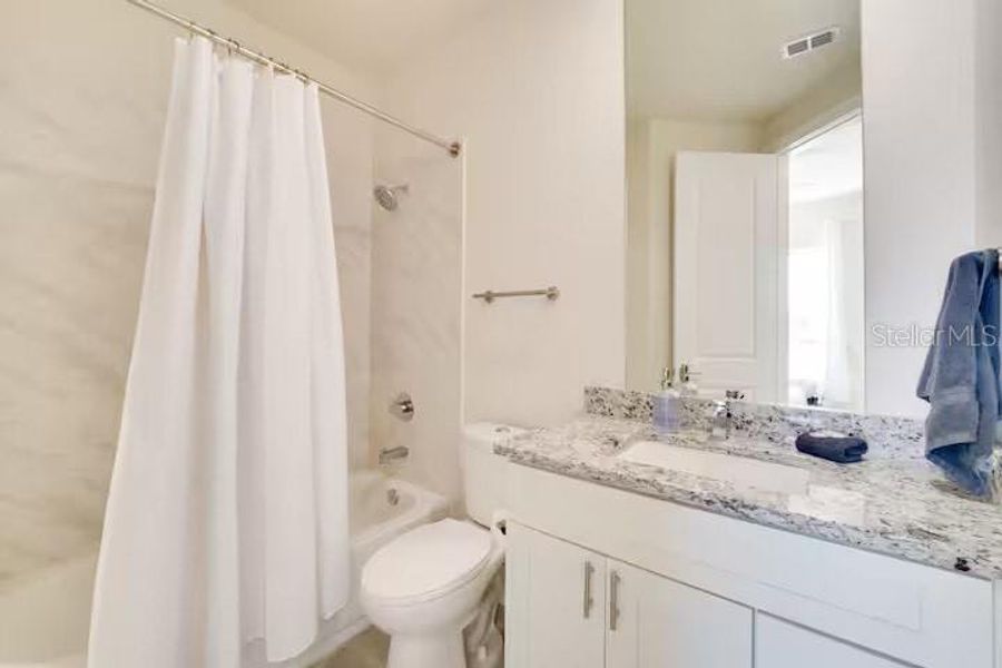 Furnished interior view inside a new home in , Kissimmee (Image 14). Furnished interior view inside a new home in , Kissimmee (Image 14).