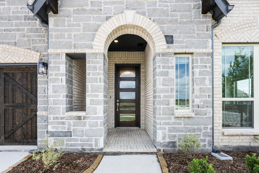 Exterior details and patio area of a home in Terracina, Rockwall (Image 27). Exterior details and patio area of a home in Terracina, Rockwall (Image 27).