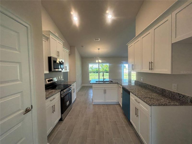 Furnished interior view inside a new home in Deep Creek, Punta Gorda (Image 8).