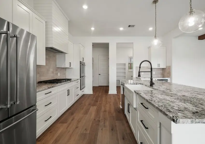 Stainless steel appliances are included